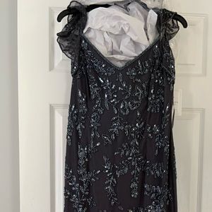 Gown gunmetal color-brand new. Tags on